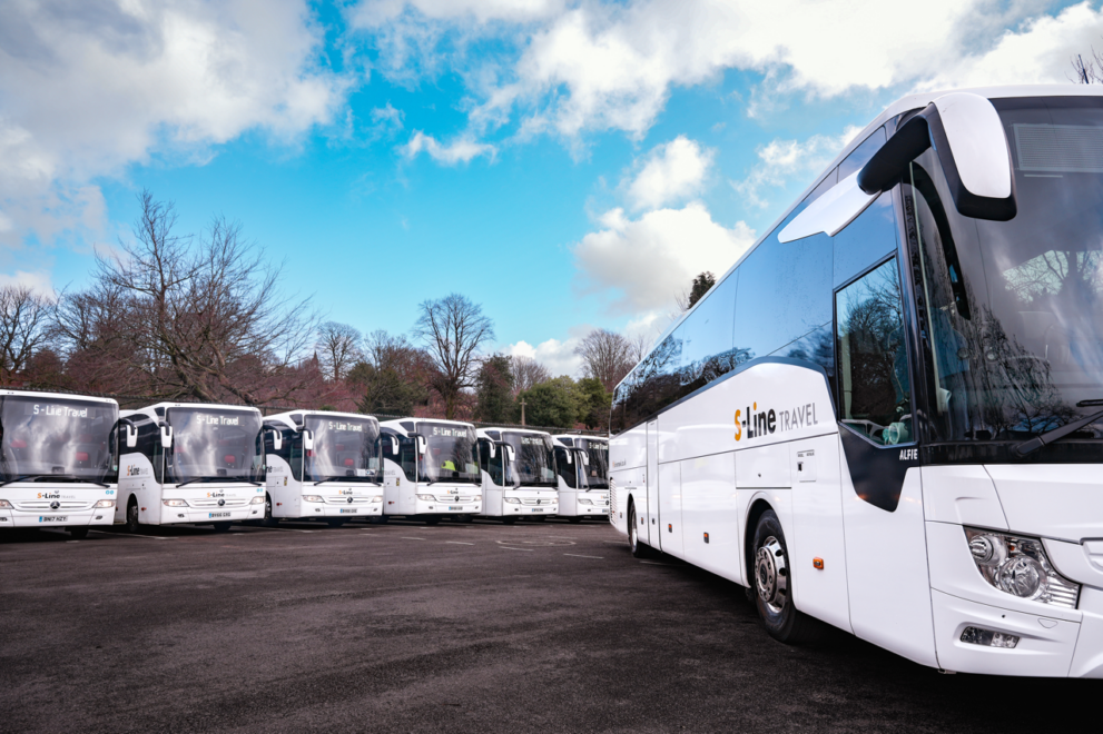 S-Line Travel modern touring coaches featuring contemporary interiors and professional fleet branding, providing reliable coach hire for school trips, corporate transport, private events and UK group travel across Lancashire and the North West.
