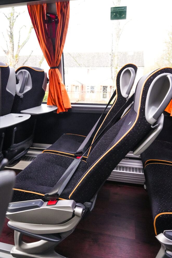 Reclining luxury coach seat inside S-Line Travel VIP Mercedes executive coach, offering premium comfort for corporate events, weddings and private coach hire across Lancashire and the North West UK.