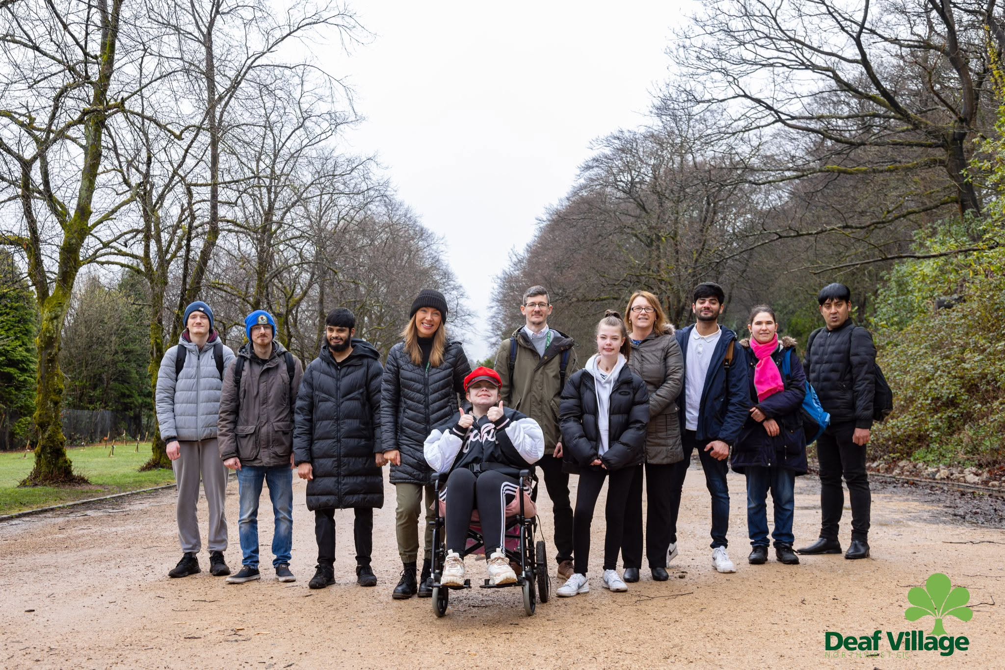 Young people and staff visiting Deaf Village North West